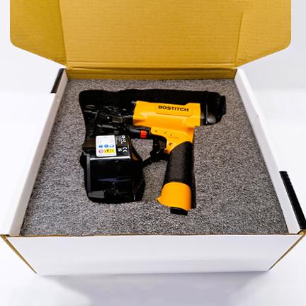 image showing a yellow drill in a box